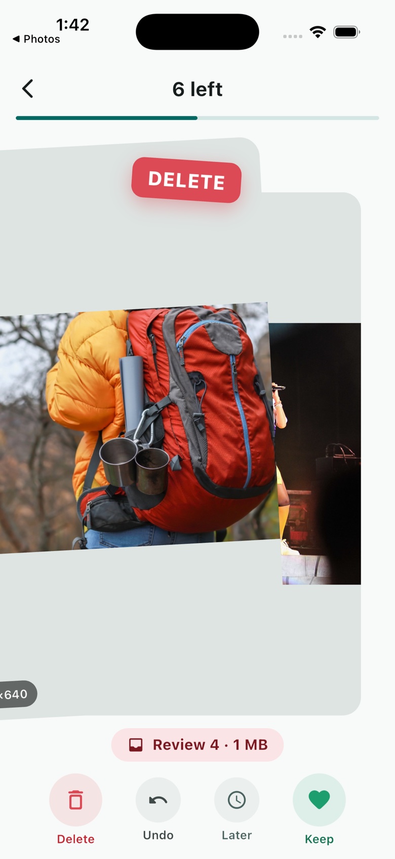 A card being dragged left in the Swippr deck, a red DELETE stamp above a photo of a red hiking backpack, with a Review 4 and 1 MB bin chip below